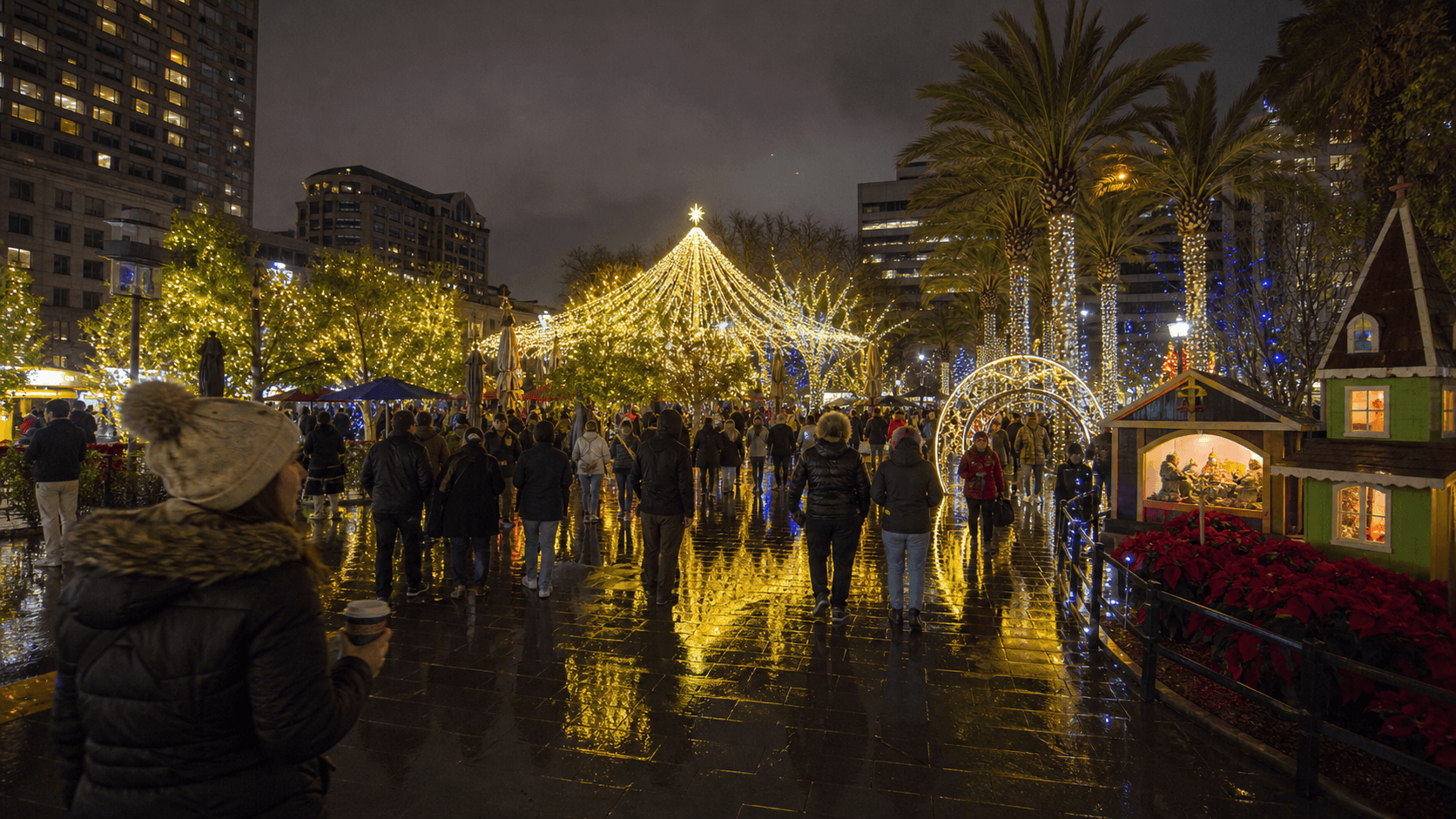 Christmas in the Park visitors in winter coats walking beneath lights reflected on wet San Jose pavement