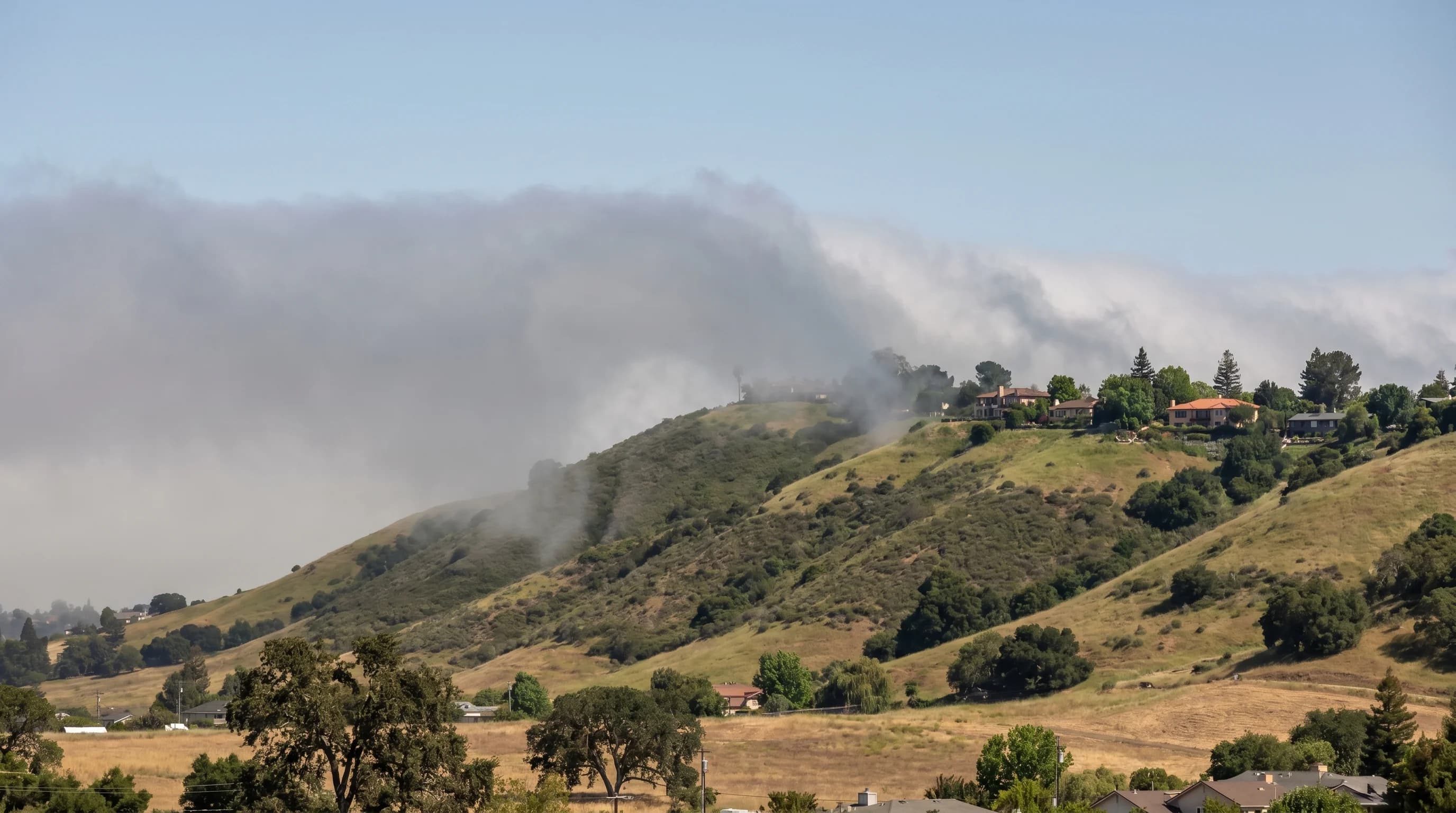Temperature gradient map showing San Francisco at 62°F, Oakland at 78°F, Walnut Creek at 92°F, and Livermore at 98°F on a typical summer afternoon, demonstrating the coast-to-inland temperature increase